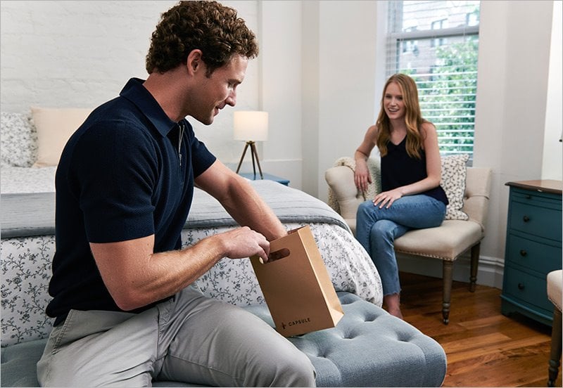 Man opening a same-day home prescription delivery