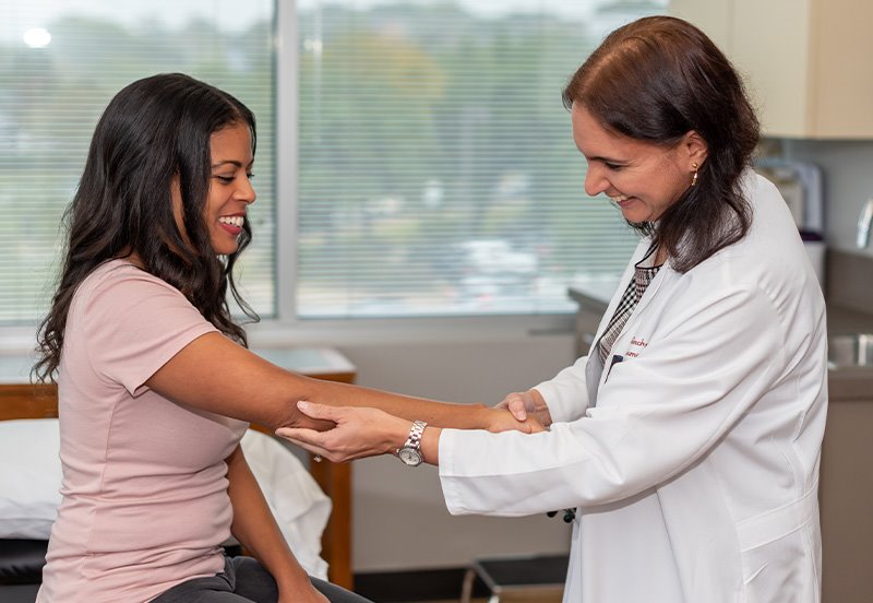 ARC Rheumatologist seeing a patient during a clinical study